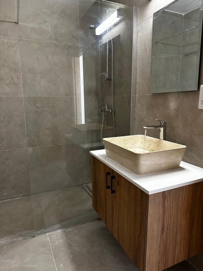 Stone Court Boutique Hotel de apartamente