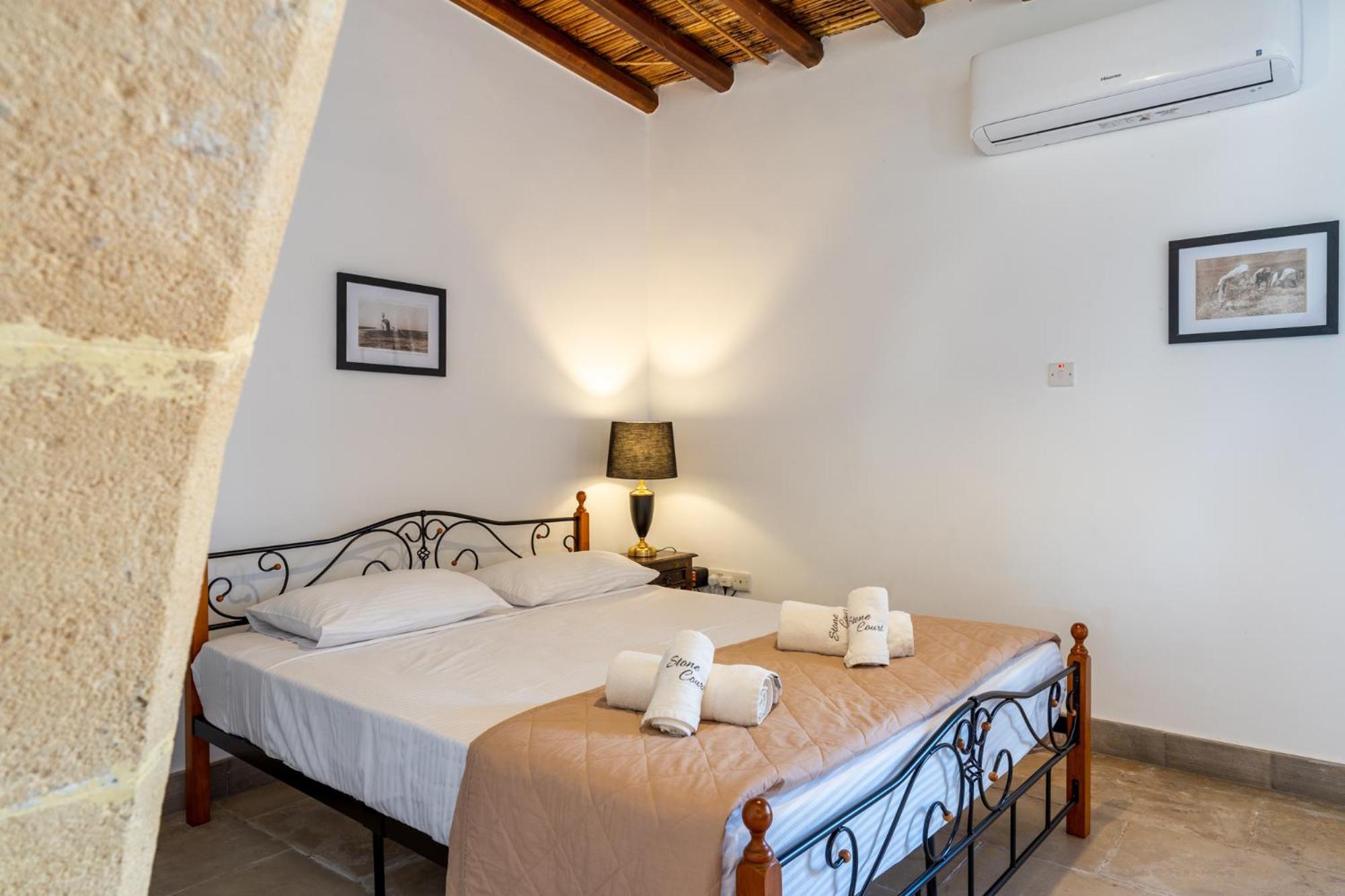 Hotel de apartamente Stone Court Boutique Miliou